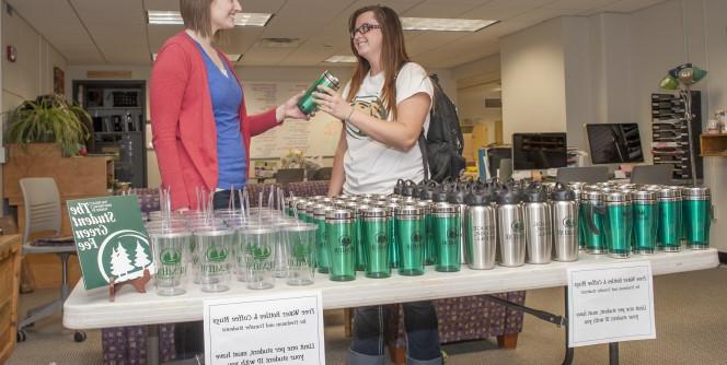 Students giving away free reusable containers