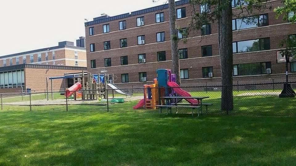 Exterior and playground of Cedar Hall